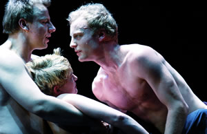 Ronald Kukulies as Orestes, Yvon Jansen as Hermione, and Mark Waschke as Pyrrhus in "Andromache," directed by Luk Perceval at the Schaubuhne, Berlin