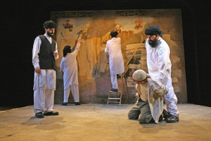 Taliban whitewash the mural in "The Great Game." Photo: John Haynes.